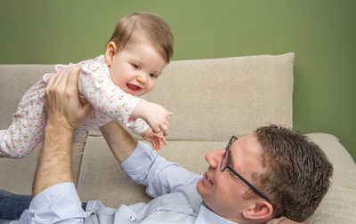 Portrait of father and baby boy