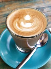 Close-up of cappuccino on table