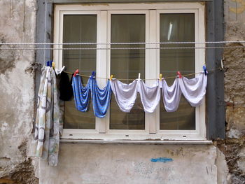 Clothes drying against window