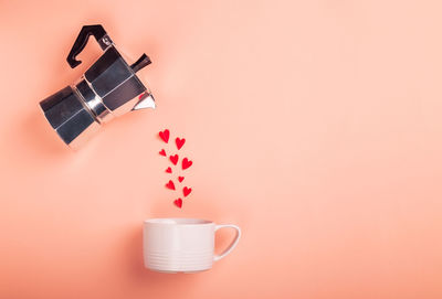 Close-up of coffee cup on table