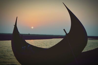 View of calm sea at sunset