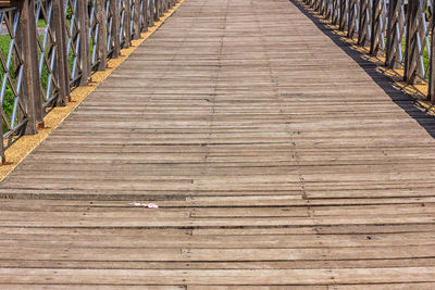 High angle view of boardwalk on footbridge