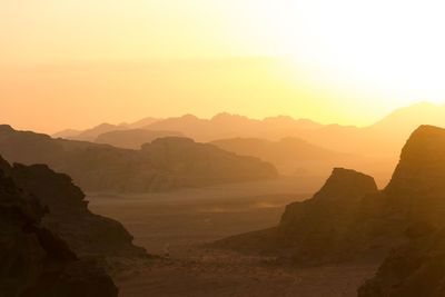 Scenic view of mountains against sky during sunset