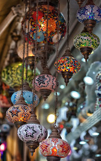 Low angle view of lanterns hanging in market for sale