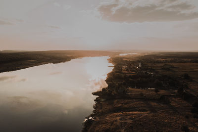 Aerial view of townscape against sky during sunset