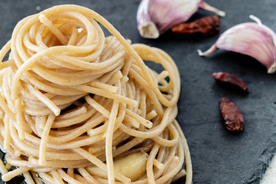 High angle view of pasta in plate on table