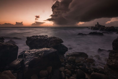 Scenic view of sea against sky during sunset