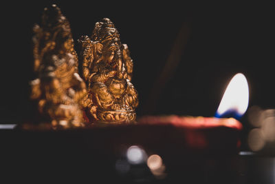 Close-up of illuminated statue