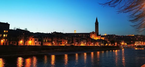 Illuminated buildings at waterfront