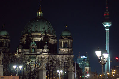 Low angle view of illuminated building at night