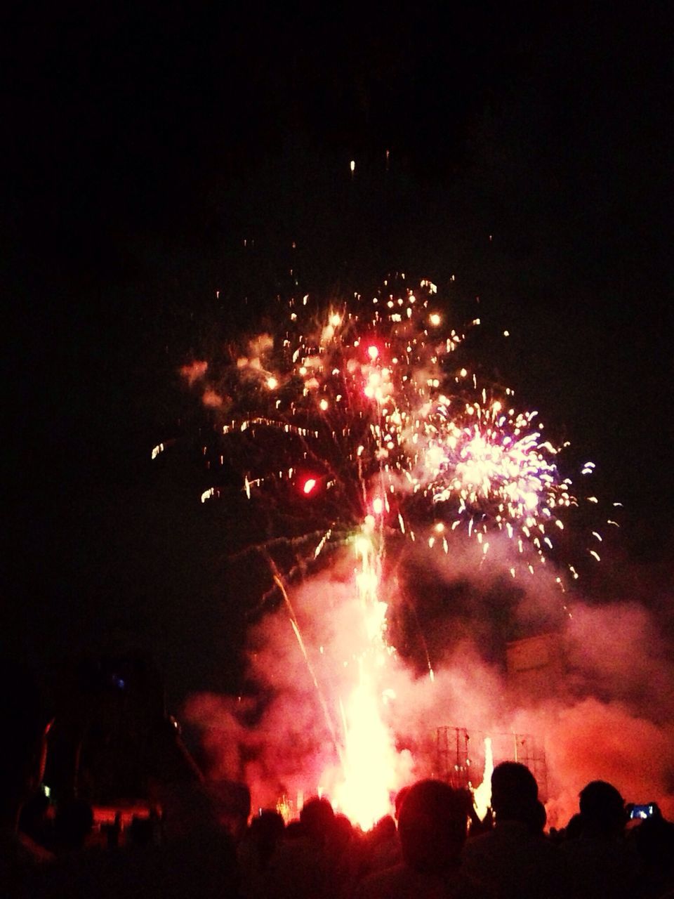 night, firework display, illuminated, celebration, exploding, long exposure, firework - man made object, event, glowing, arts culture and entertainment, sparks, motion, firework, entertainment, fire - natural phenomenon, sky, blurred motion, celebration event, multi colored, low angle view