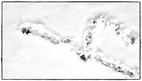 Close-up of snow against sky