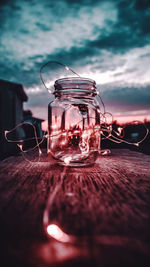 Close-up of glass jar on table