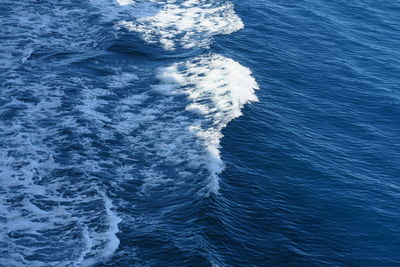 High angle view of surf in sea