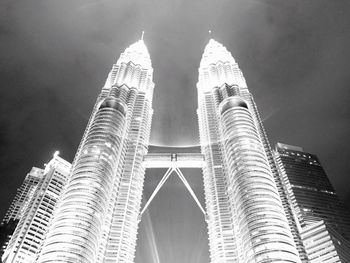 Low angle view of modern skyscrapers against sky