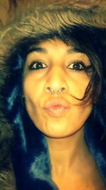 Close-up portrait of a smiling young woman