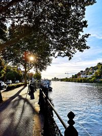 Sun shining over river