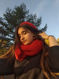 Portrait of young woman in hat