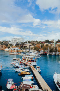 Boats moored at harbor