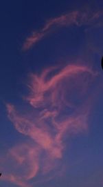 Low angle view of dramatic sky during sunset