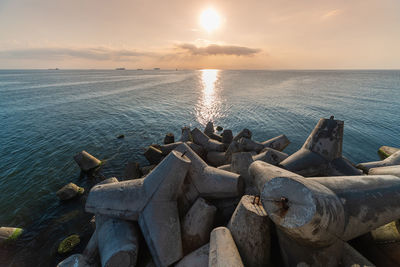 Scenic view of sea against sky during sunset