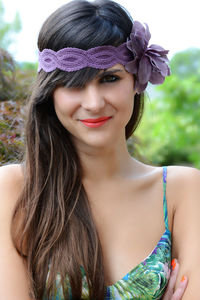 Portrait of smiling woman wearing headband