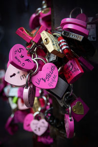 Close-up of padlocks on railing