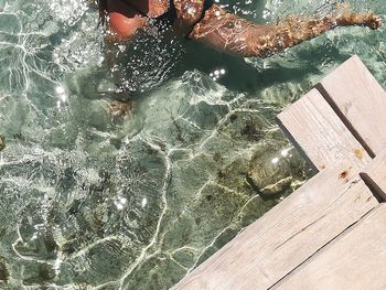 High angle view of person swimming in pool