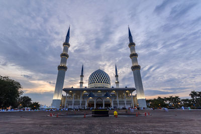 View of building against cloudy sky