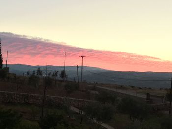 Landscape against sky during sunset