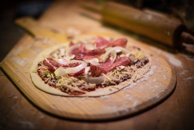Close-up of pizza on cutting board