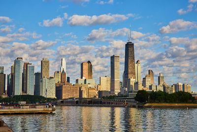 Buildings in city against sky