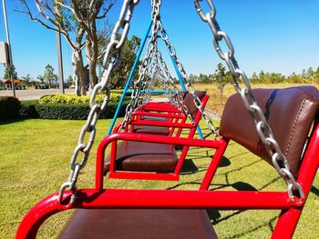 Empty swing in park