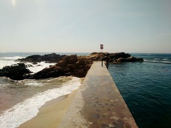 Walkway leading towards sea
