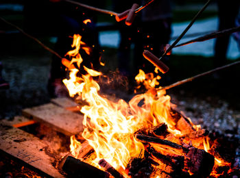 Sausages on bonfire