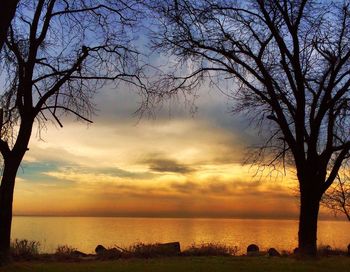 Scenic view of sea against cloudy sky