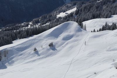 Scenic view of snow covered mountains