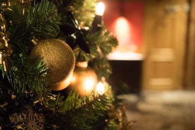 Close-up of illuminated christmas tree at night