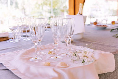 Close-up of wineglasses on table
