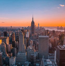 Aerial view of buildings in manhattan during sunset