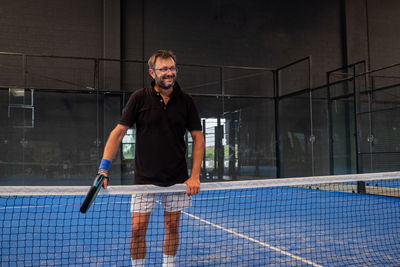 Full length portrait of a man playing