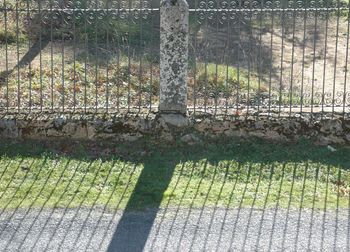 Fence seen through chainlink fence