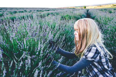 Woman standing in garden