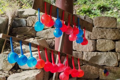 High angle view of multi colored balloons against wall