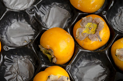 High angle view of orange fruits