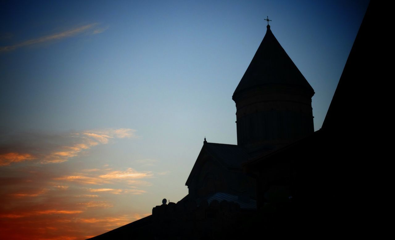 LOW ANGLE VIEW OF SILHOUETTE BUILT STRUCTURES AGAINST SKY