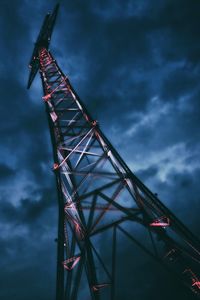 Low angle view of ferris wheel against sky