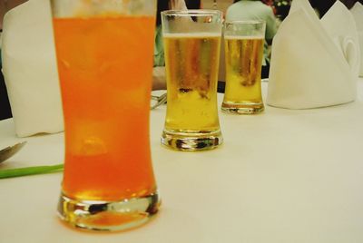 Close-up of beer in glass on table