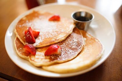 High angle view of pancakes served on table at home