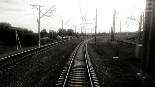 Railroad tracks against sky